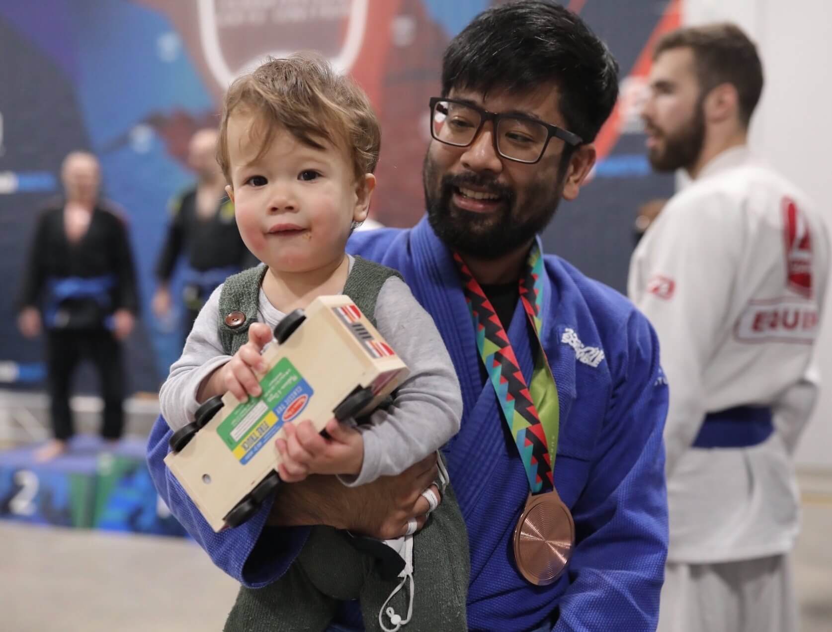 Tetsuro and his boy after a BJJ competion.